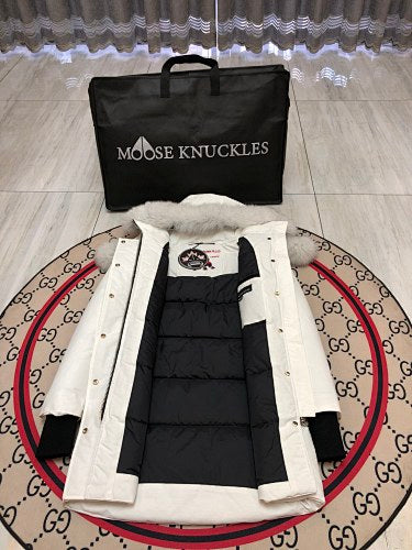 Moose Knuckles Women's White Long Parka with Fur-Style Hood Trim